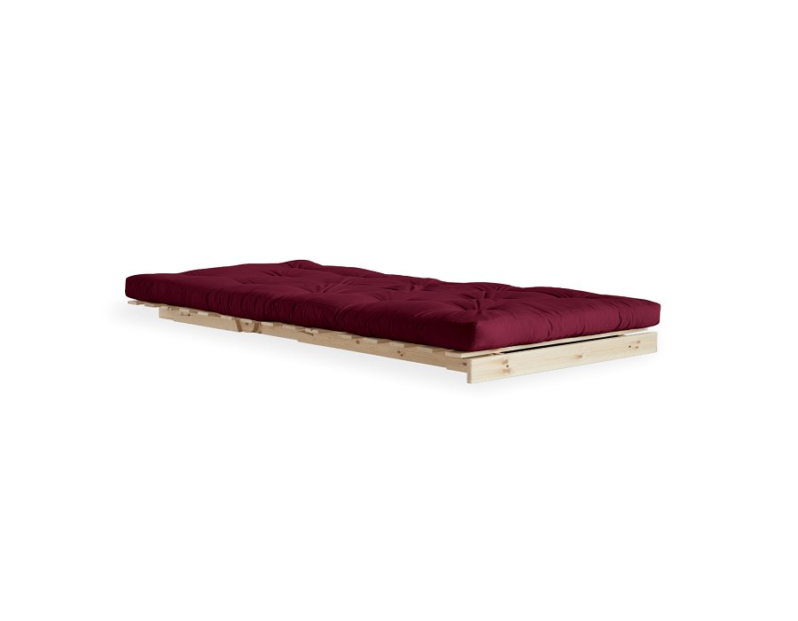 Fauteuil convertible futon ROOTS pin naturel coloris bordeaux couchage 90 x 200 cm.